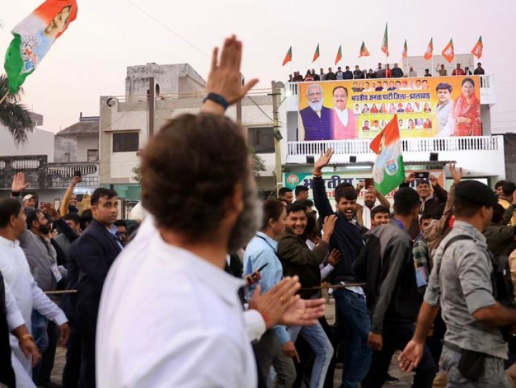 Rahul Gandhi Blew Kisses And Waved At The People Standing At The Rooftop Of The BJP Office.